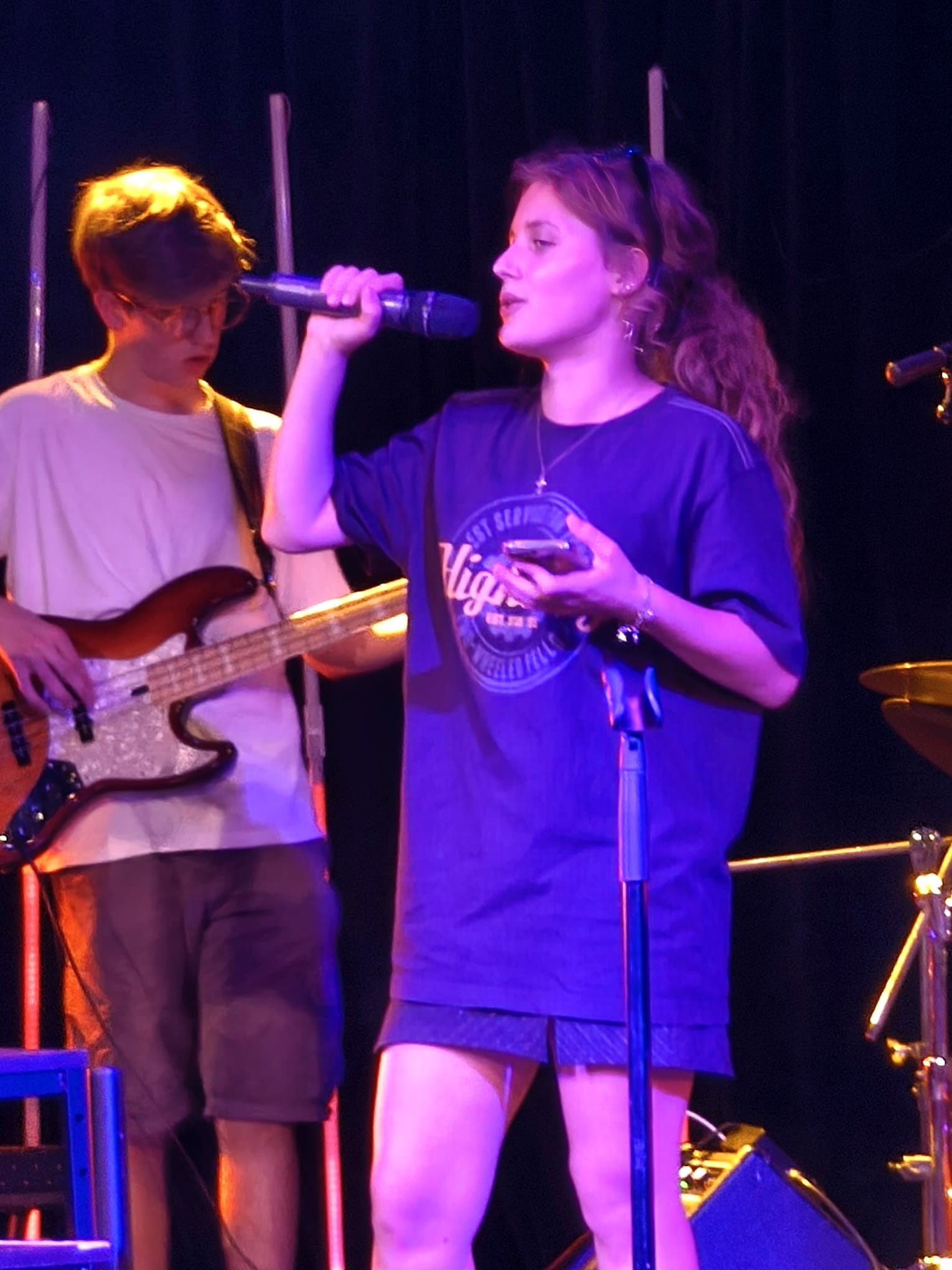 Vocalist and bassist performing together